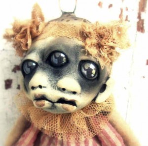 Creepy Halloween demon baby doll